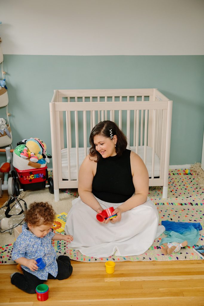 one year old playing with blocks